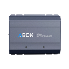 ABOK ACS500 DC-DC battery charger in a straight product view showing its ribbed aluminum housing and ABOK branding.
