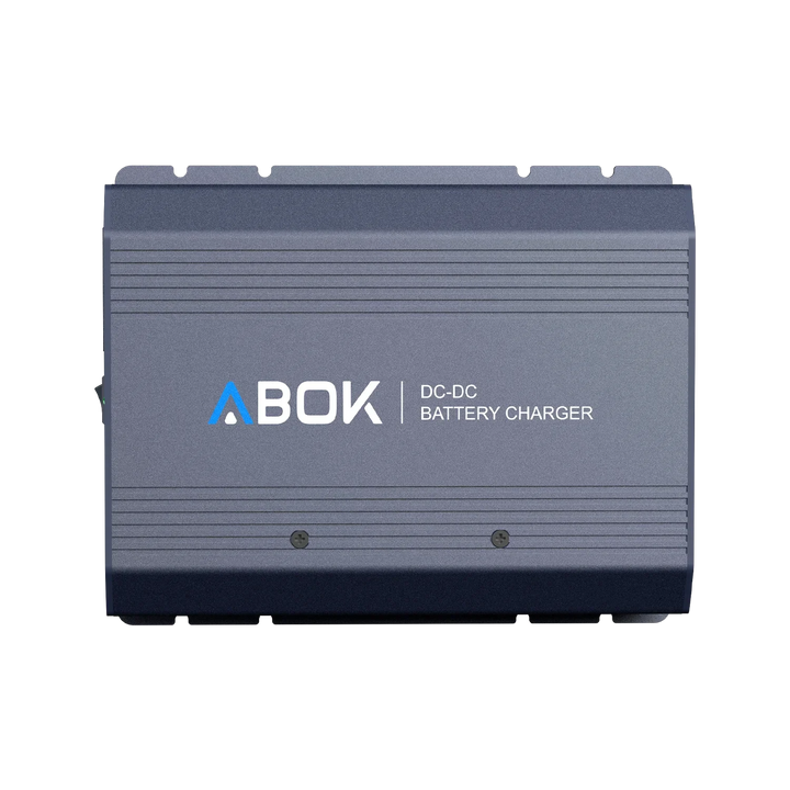 ABOK ACS500 DC-DC battery charger in a straight product view showing its ribbed aluminum housing and ABOK branding.