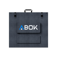 ABOK ASP200 foldable 200W solar panel shown closed from the rear with carry handle, buckles, and cable pouch.